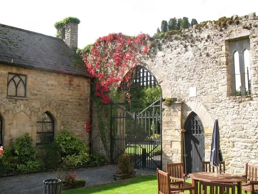 Kinnity Castle courtyard. Unique accommodation Ireland. Travel Agent Finder.