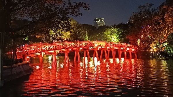 Hanoi Red Bridge at night, exploring the colours of Vietnam.