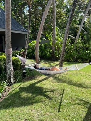 Fiji Travel agent Linda Kiernander enjoying the hammock on Kokomo Private Island Fiji.