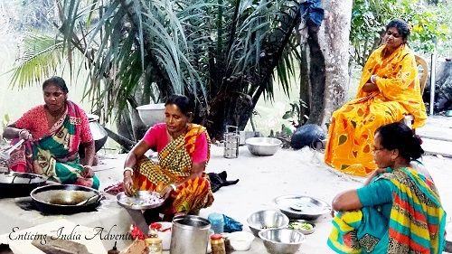 Ladies cooking at Bali Island, Ganges River Cruise port of call.