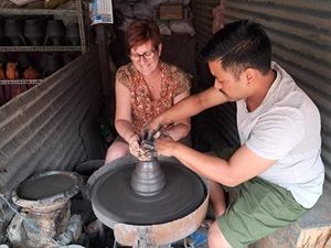 Kerstin Rheinlander, hands on at our pottery lesson in Nepal.