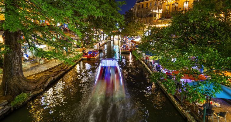 The San Antonio River Walk at night.