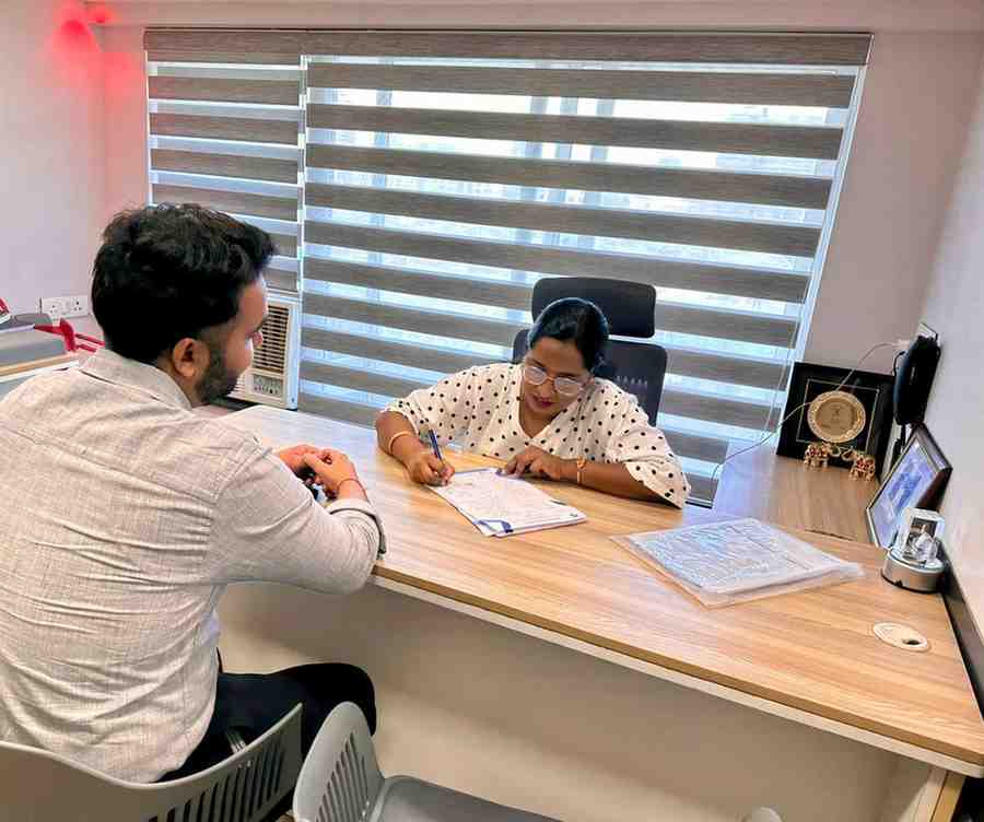 Dr. Kavita with Patient