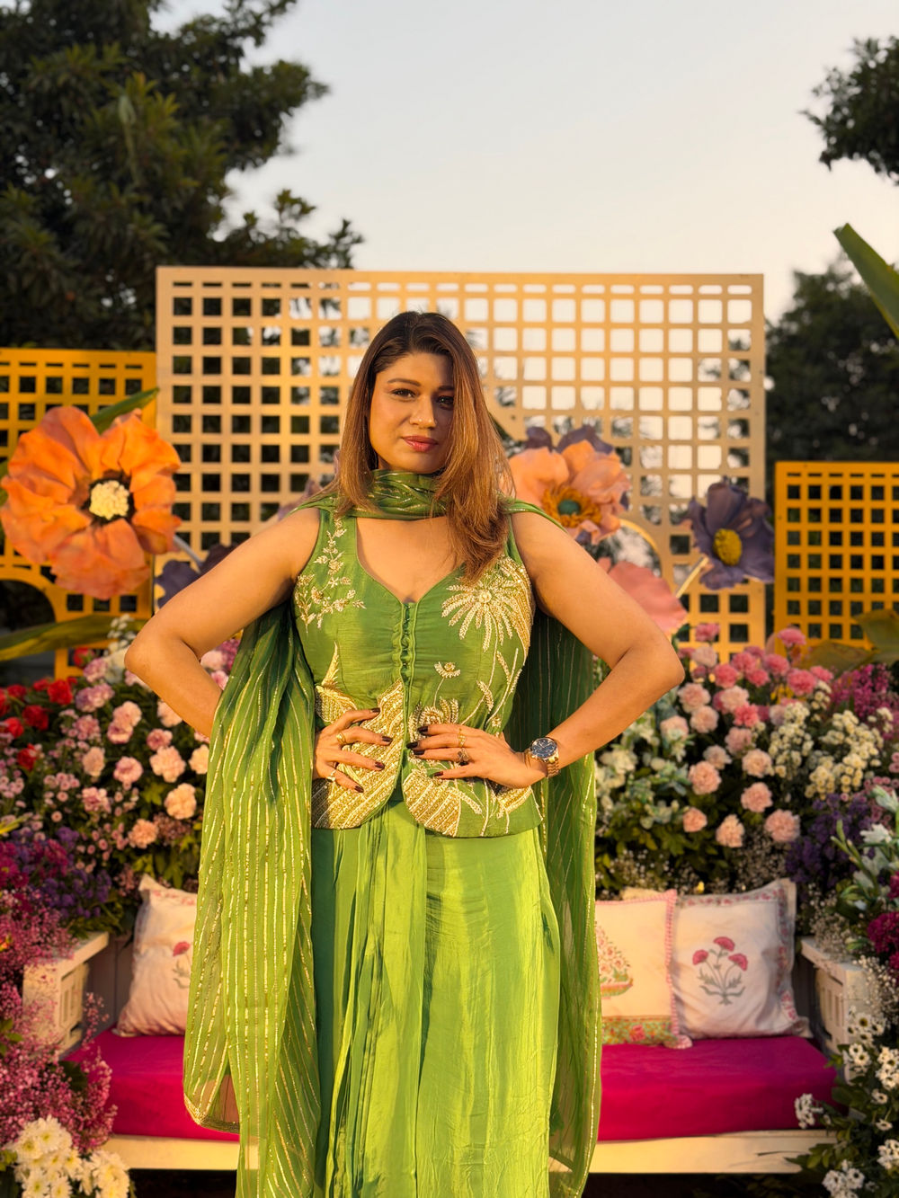 Monica Singh at a wedding function in a green embroidered outfit