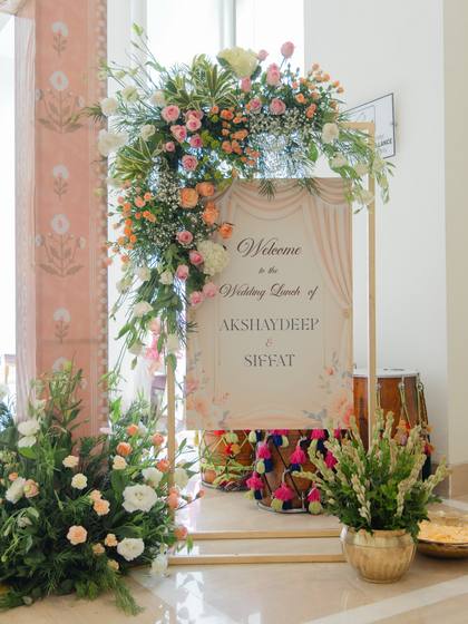 Signage and Floral detail — Welcome Lunch decor — Shangri-La Bengaluru