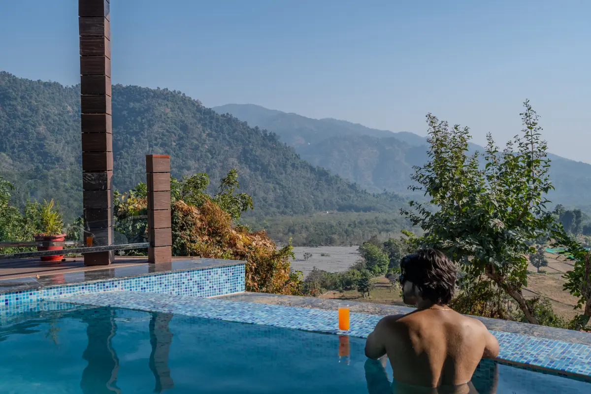 Swim amidst majestic mountain views.