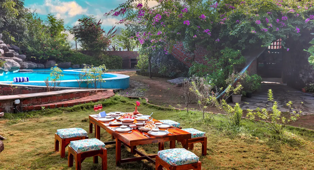 Savor a delightful outdoor breakfast with your loved ones, surrounded by nature.