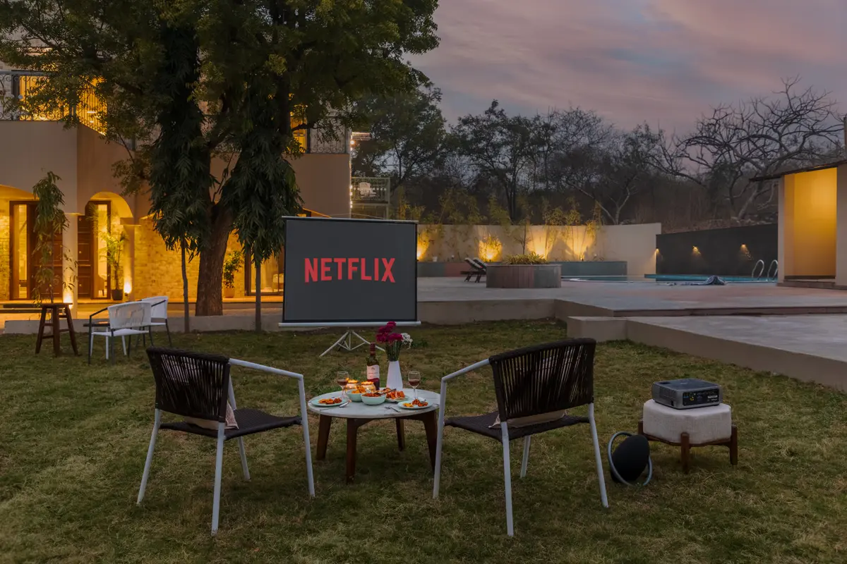 Watch Netflix with an outdoor projector screening under the stars.