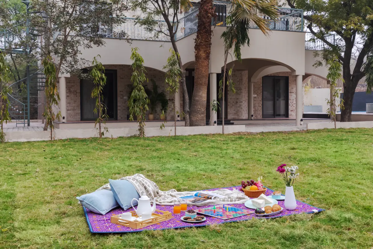 Enjoy evening high tea amidst greenery and the sunset.