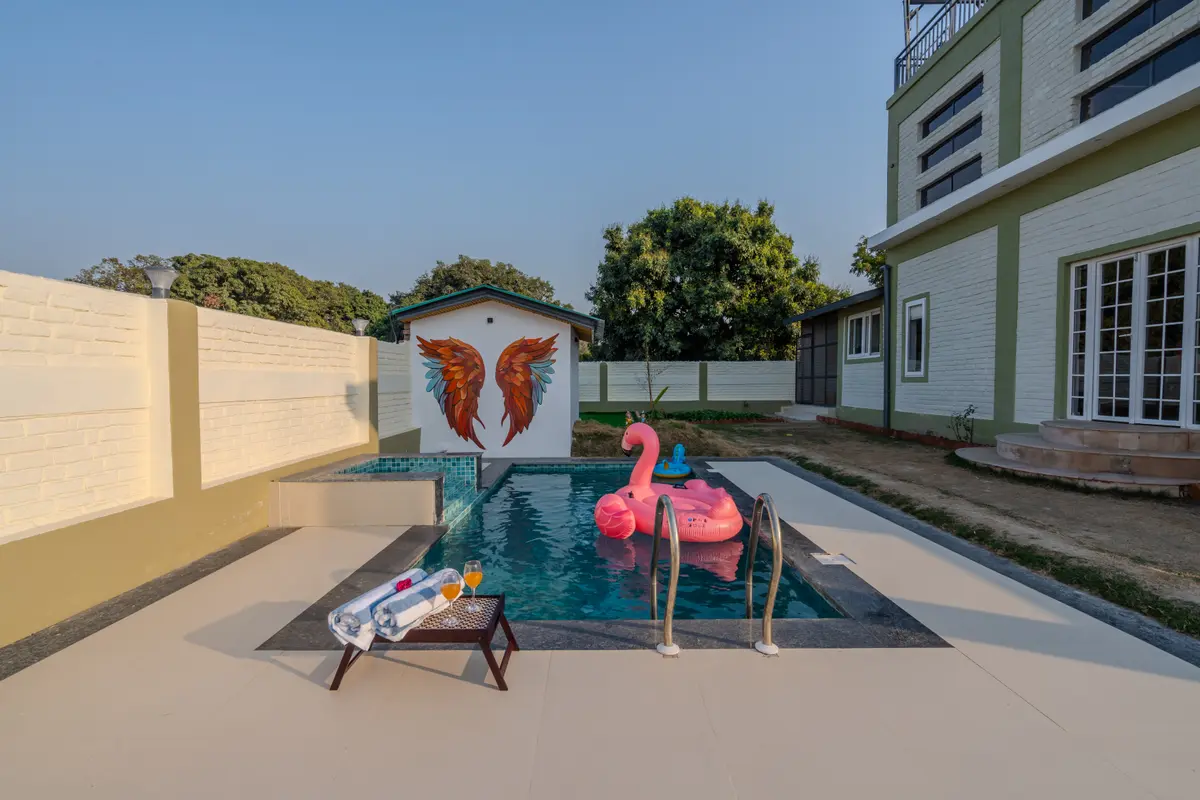 Relax by the pool, embraced by nature’s calm