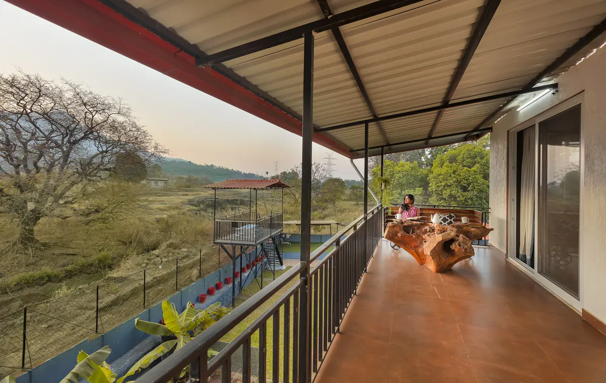 Unwind with a cup of coffee and breathtaking views from a serene balcony.