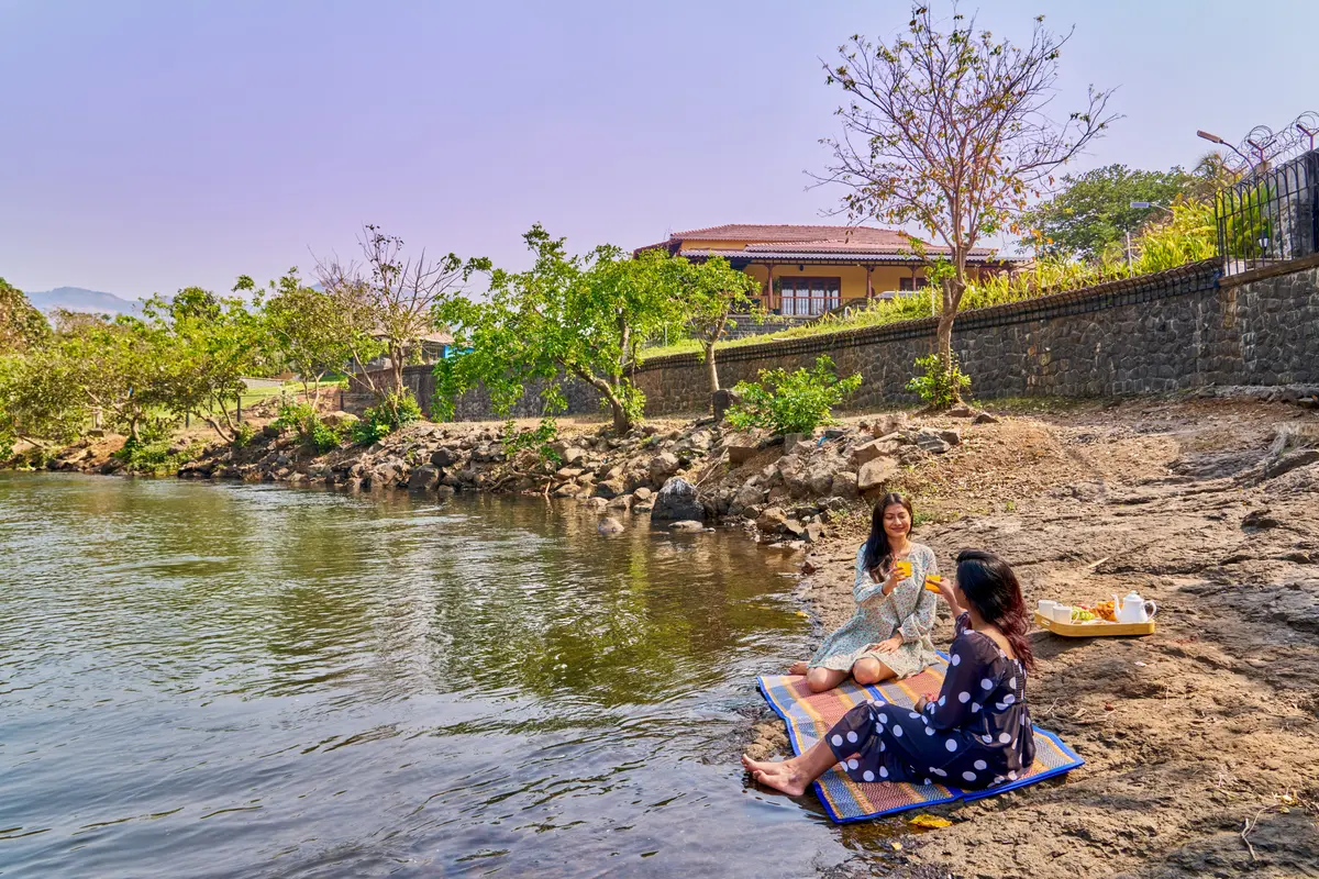Enjoy a dreamy riverside picnic with fresh air, delicious treats, and endless moments of peace.