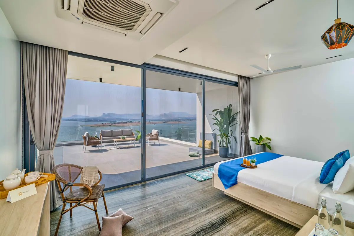 Wake up to nature’s masterpiece—endless greens and a shimmering lake, all from your bedroom!