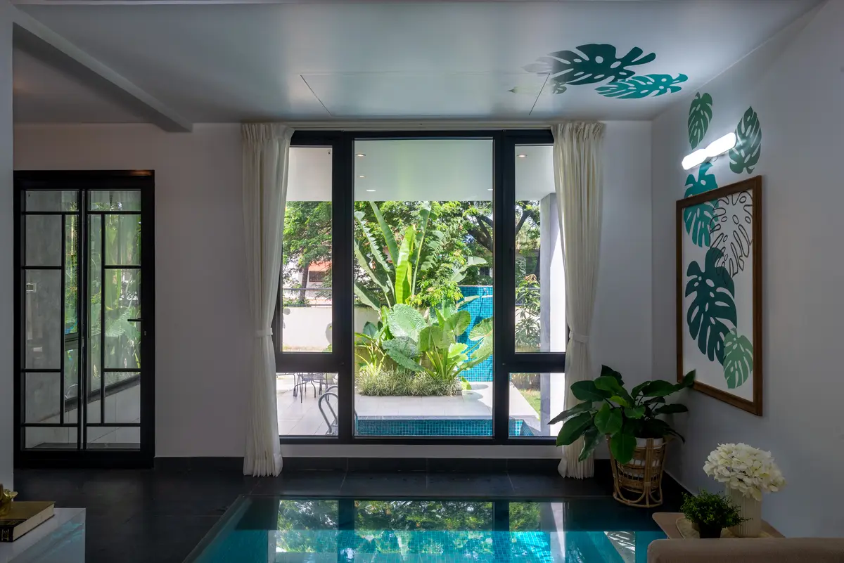 A pool that extends in the living room.