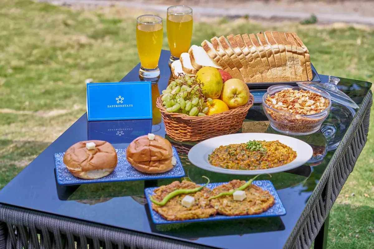 Feast on a Parsi breakfast with Lohagad Fort cheering you on!