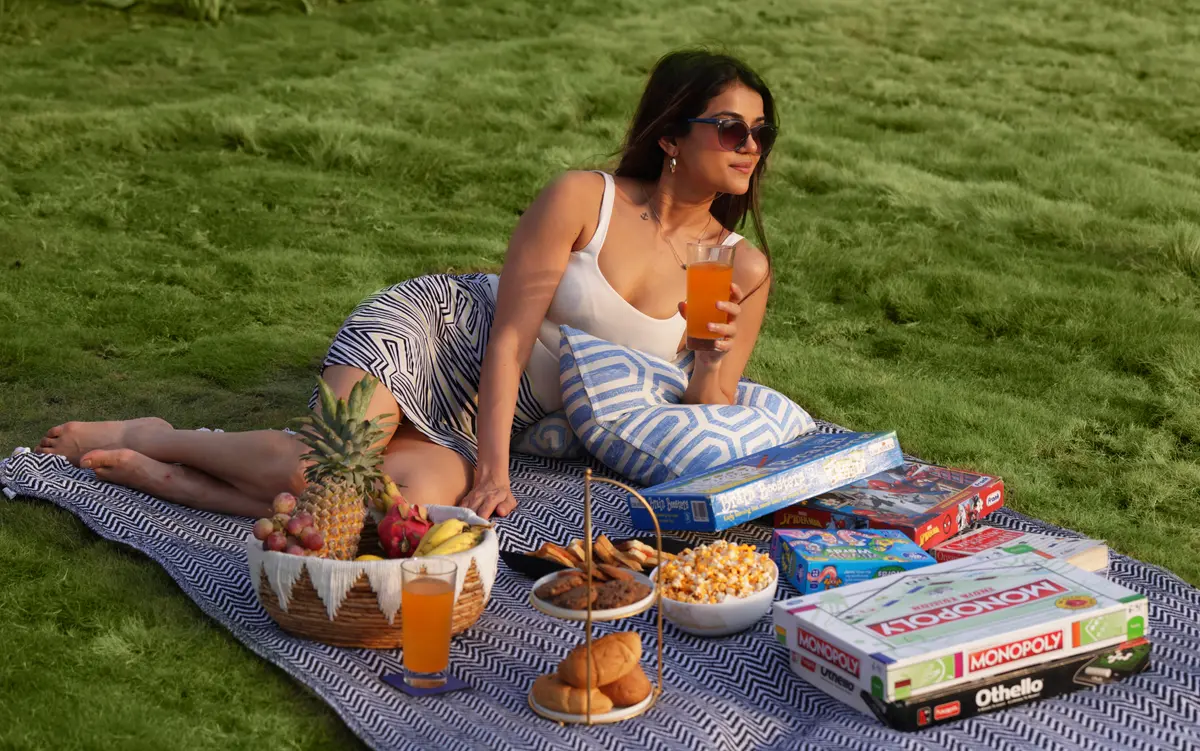 Enjoy a lovely picnic in the open air, under the warm sun.