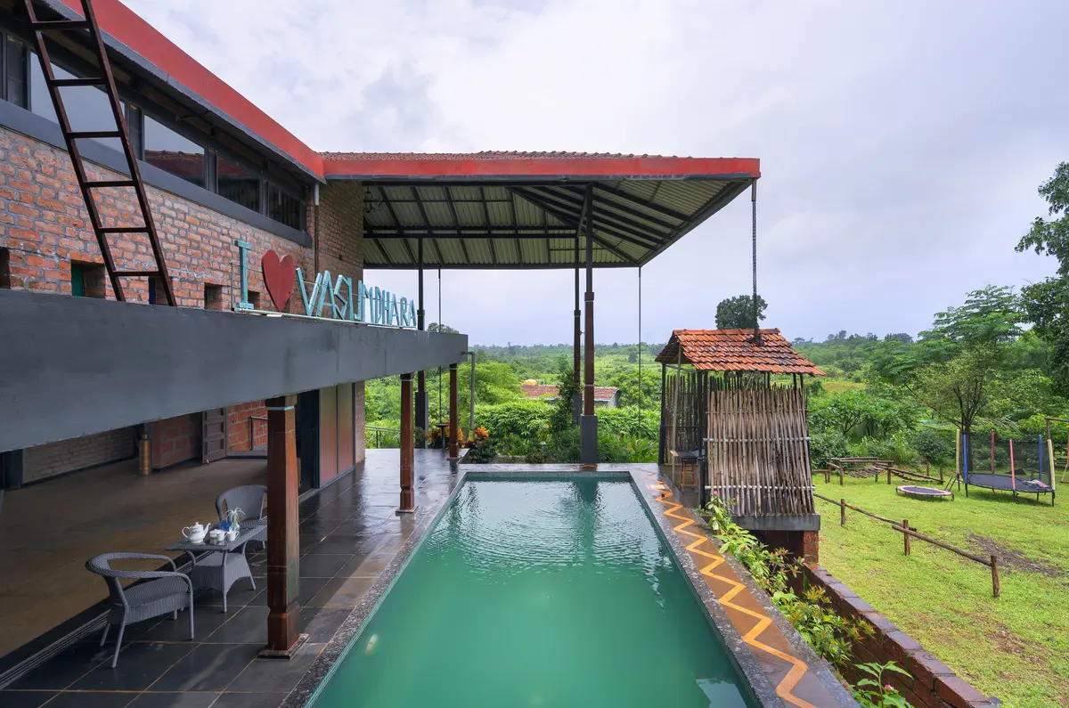 A pool with a view, fresh air, and lush greens all around—this is your sign to dive into paradise!