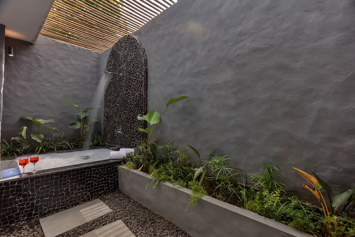 Soak in tropical bliss with an open-to-sky bath experience designed for pure indulgence and privacy.