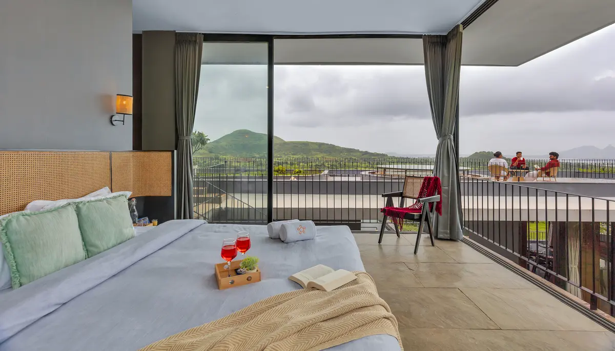 Wake up to sweeping views and soft clouds right from the comfort of your cozy, sunlit bed.