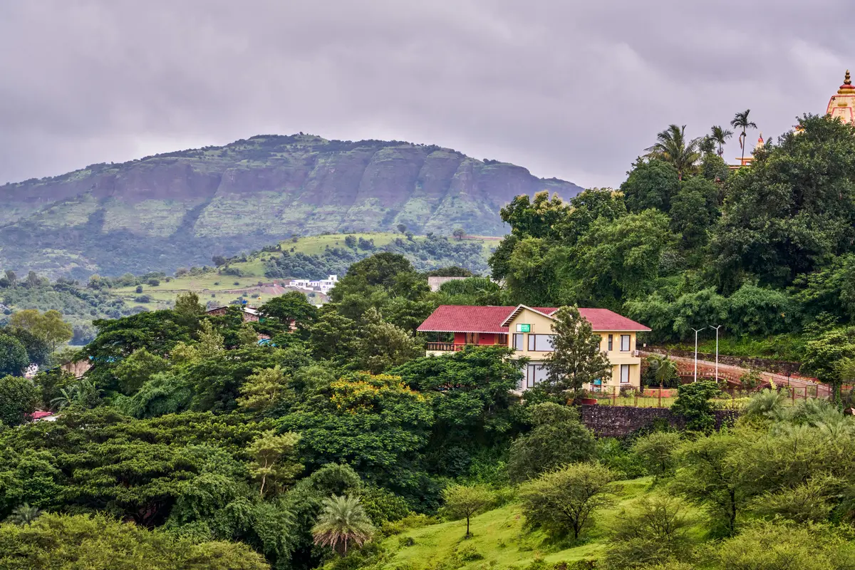 Tucked in nature’s lap, where the hills meet the home. 