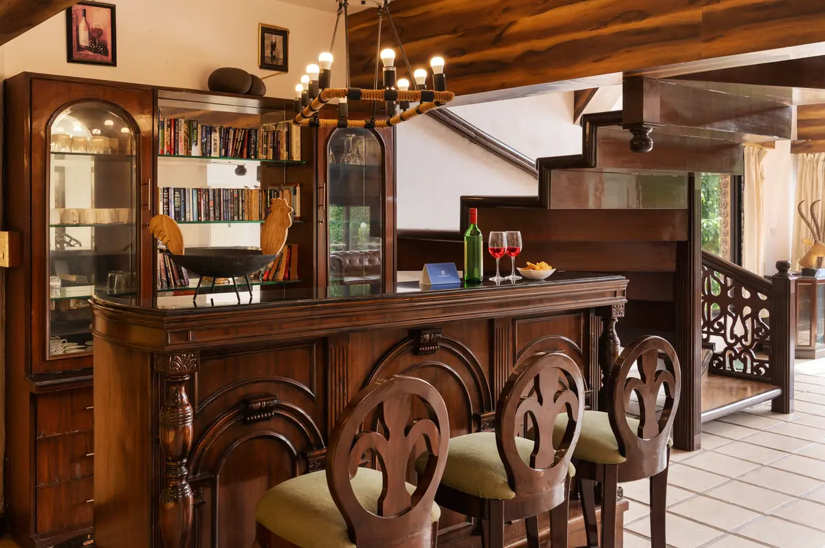 Unwind where a bar meets a stylish rooftop lounge.