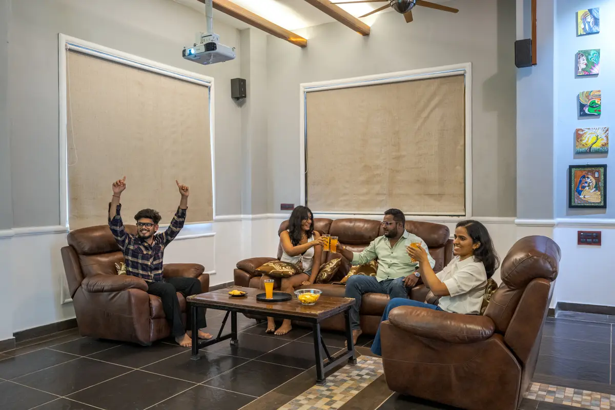 Unwind in the entertainment room with a projector, pool table, and games