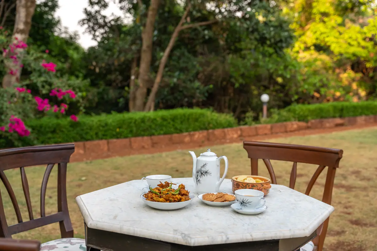 Sip chai and enjoy a peaceful hi-tea session on the lawn.