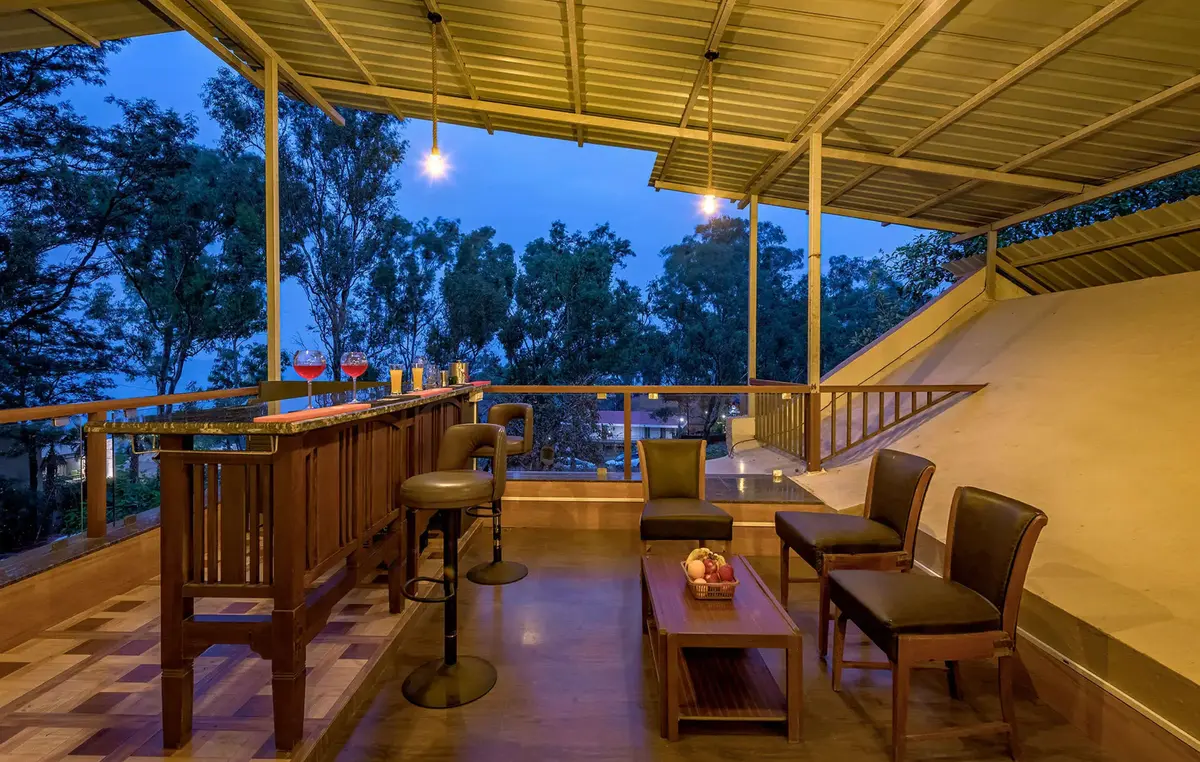 Enjoy your drinks in the open bar with the soothing Panchgani's Climate