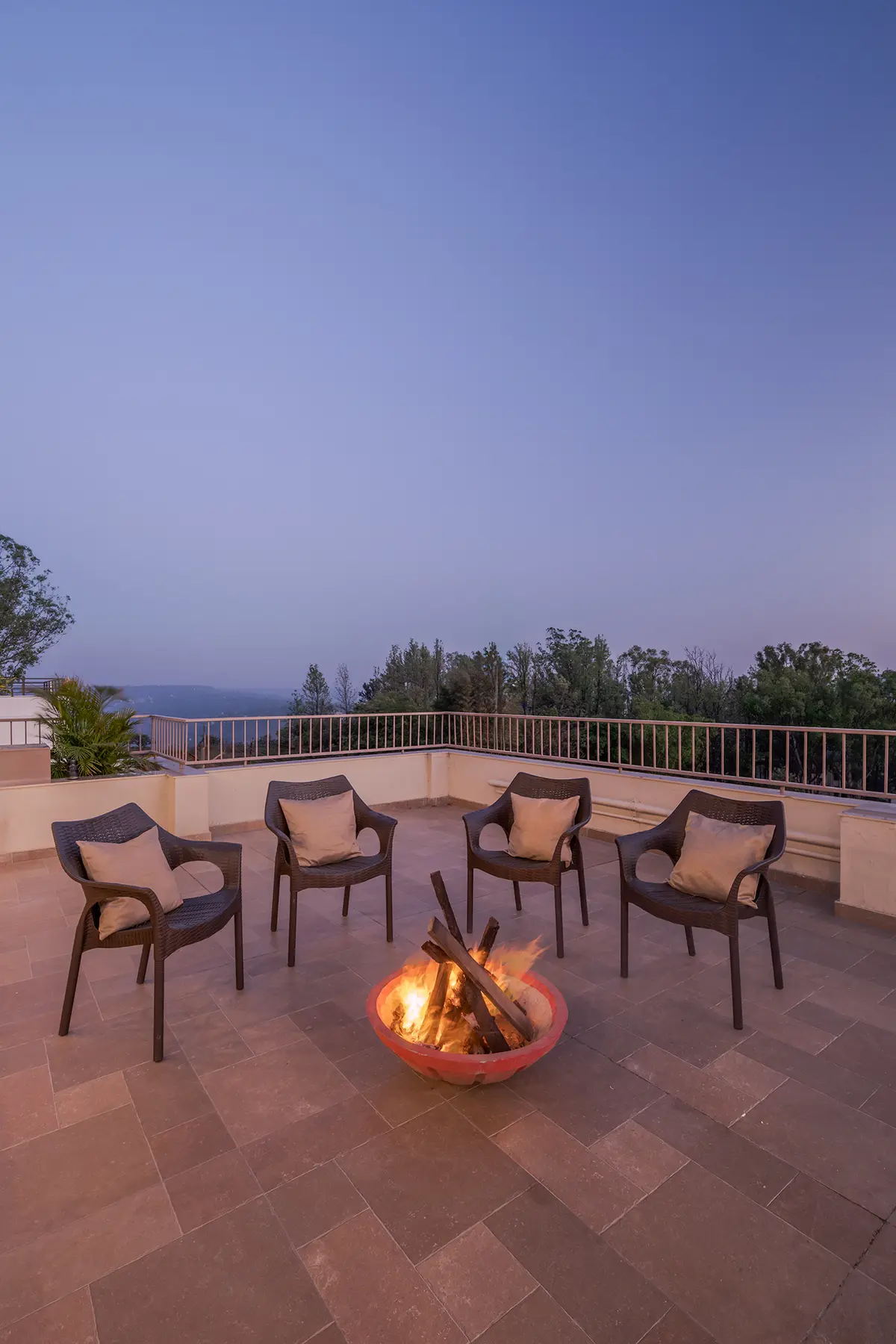 Bond with your family on the rooftop surrounded by 360° valley views, stargazing, and cozy bonfire nights.