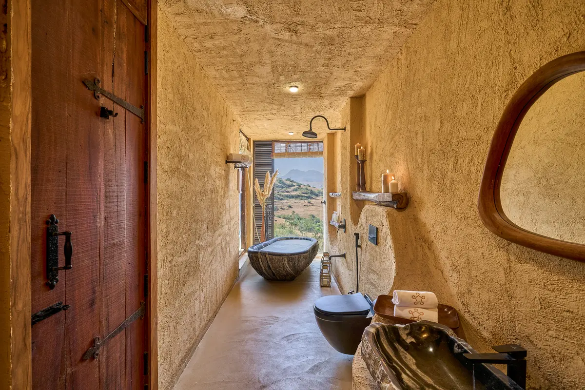 Soak in timeless luxury with a statement bathtub carved from a single slab of marble.