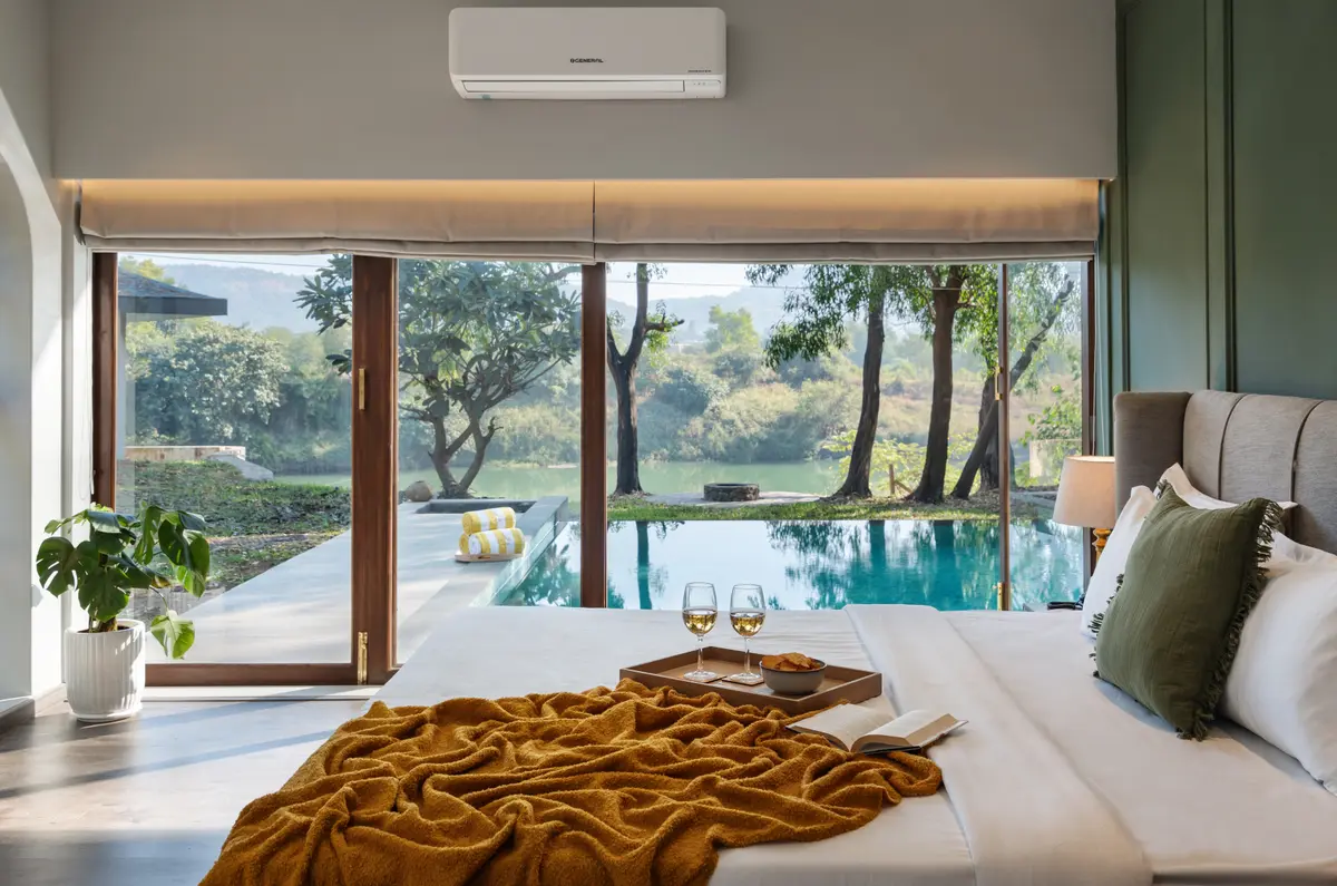 Wake up to poolside views and wind down with wine right outside your bedroom door.