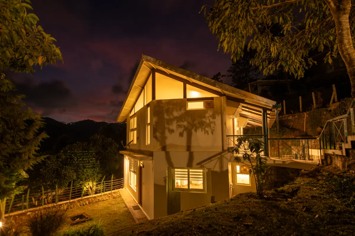 As dusk settles in, the hillside glows softly-quiet, warm, and waiting just for you.
