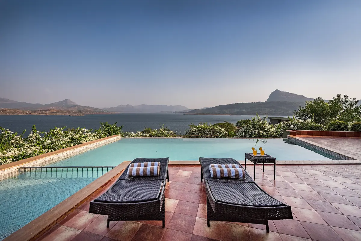 Infinity pool at Shambhala Lakeside with uninterrupted, panoramic views of Pawna Lake.