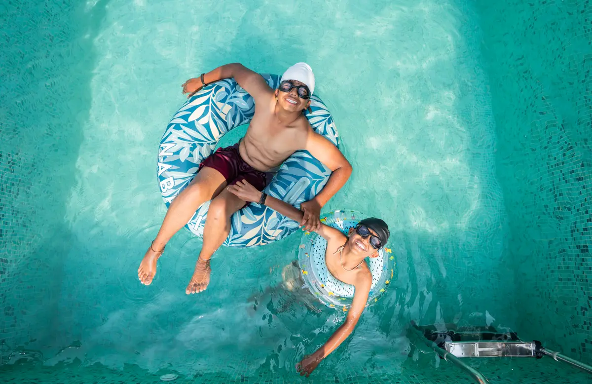 Sun-soaked pool days, laughter echoing through still waters.