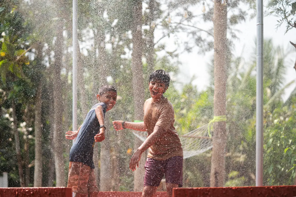 Rain dance chaos, monsoon joy, and childhood in its purest form.