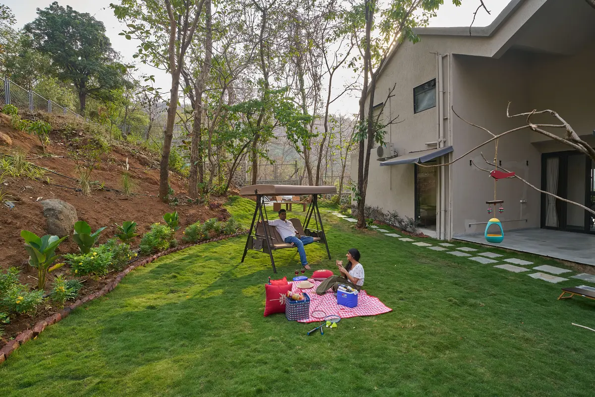 Enjoy a picnic setup in the lush green lawn.