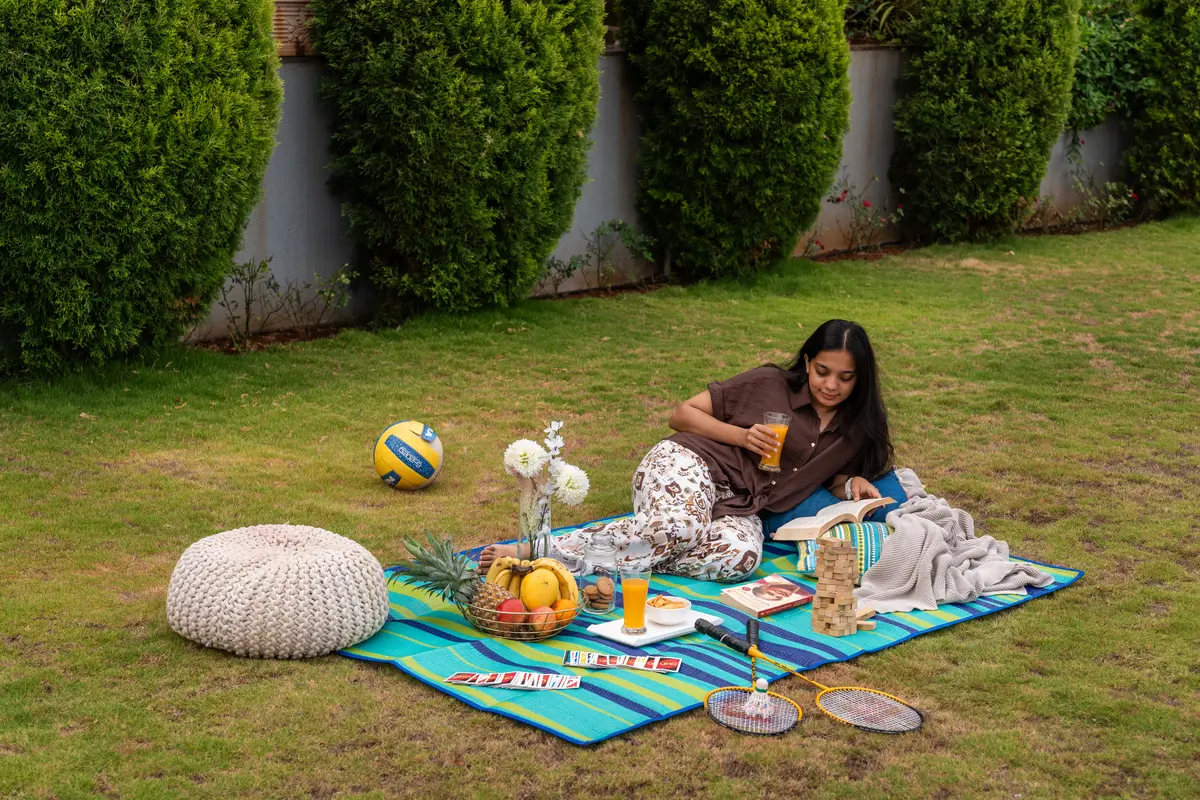 Unwind with a cozy picnic setup on the lawn or spend slow afternoons reading books.