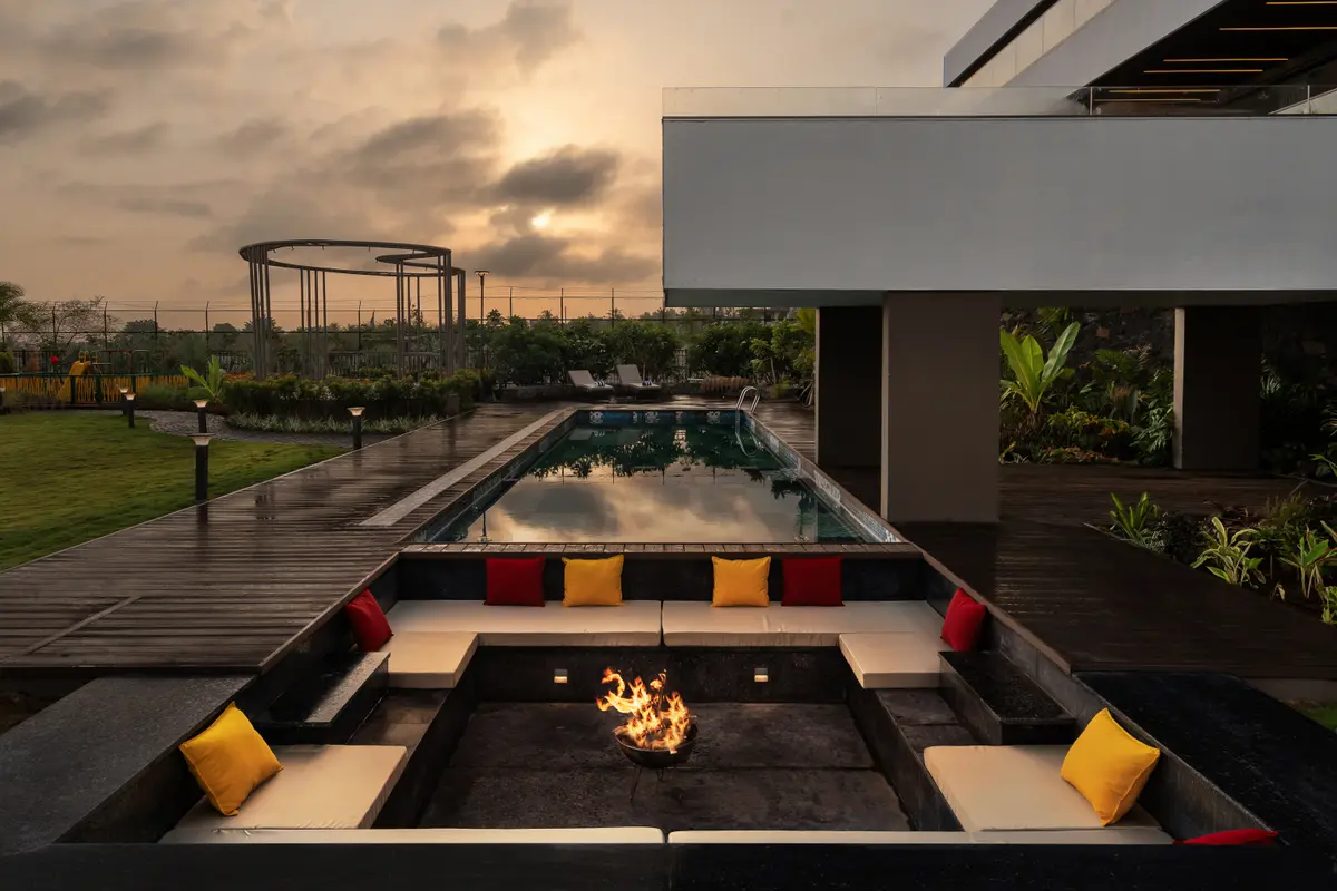 As the sky turns golden, the sunken seating becomes the perfect place to reconnect and unwind