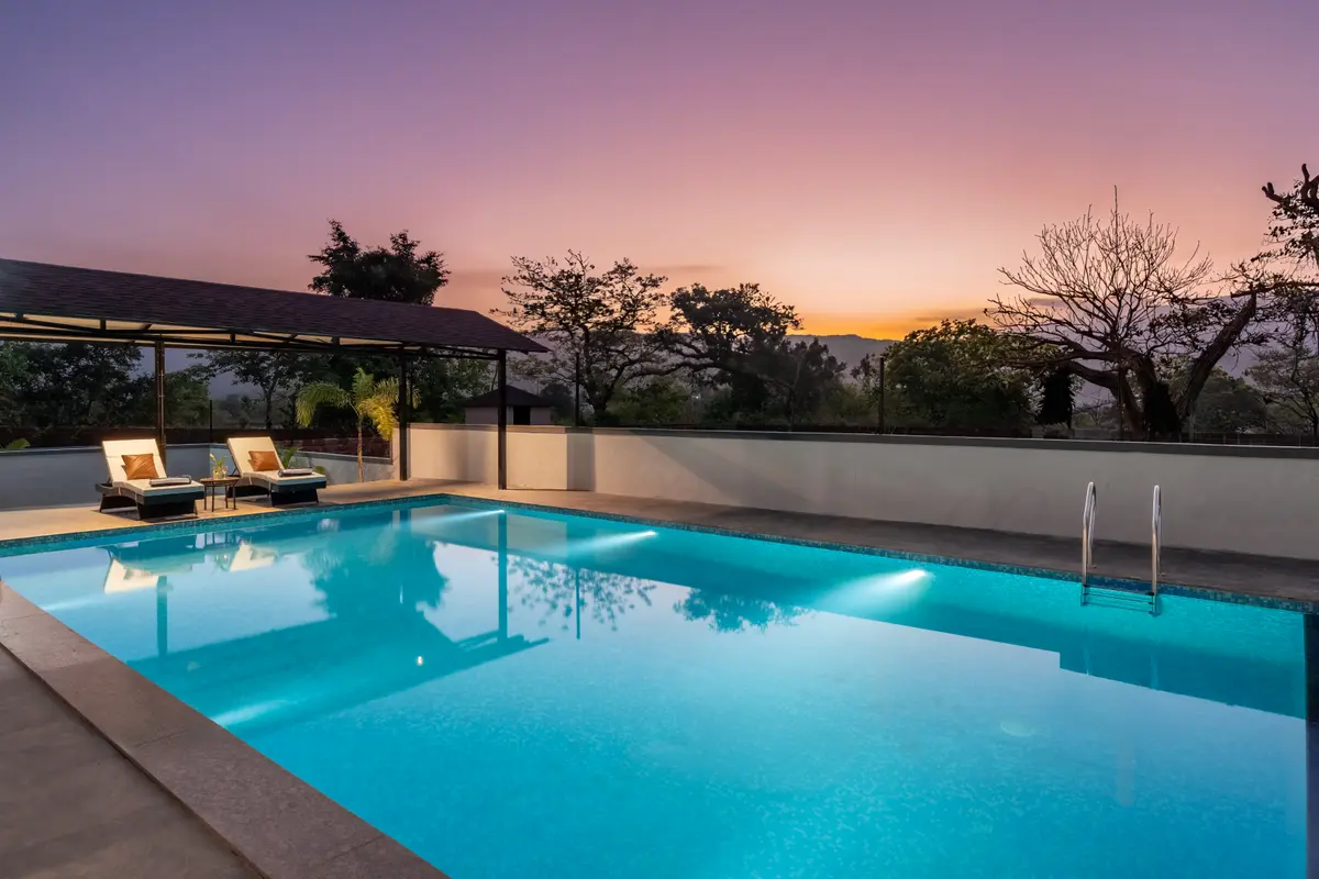 Cool off and relax with a refreshing dip in the swimming pool.