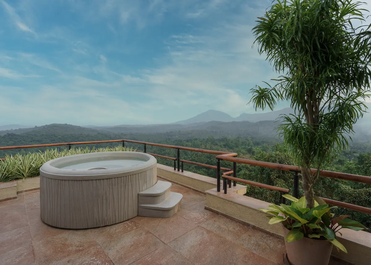 Relax in a mountain-facing jacuzzi in the master bedroom