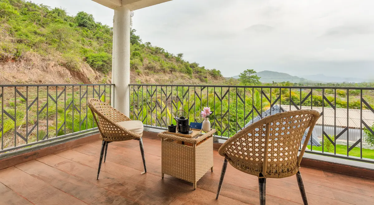 Unwind on the balcony as cool mountain breezes and scenic views set the perfect mood..