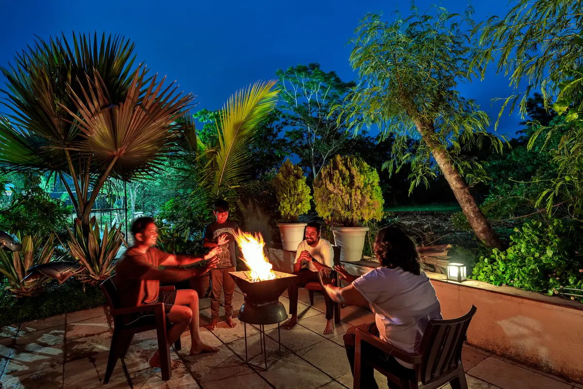 As the fire glows, conversations deepen and memories warm the night