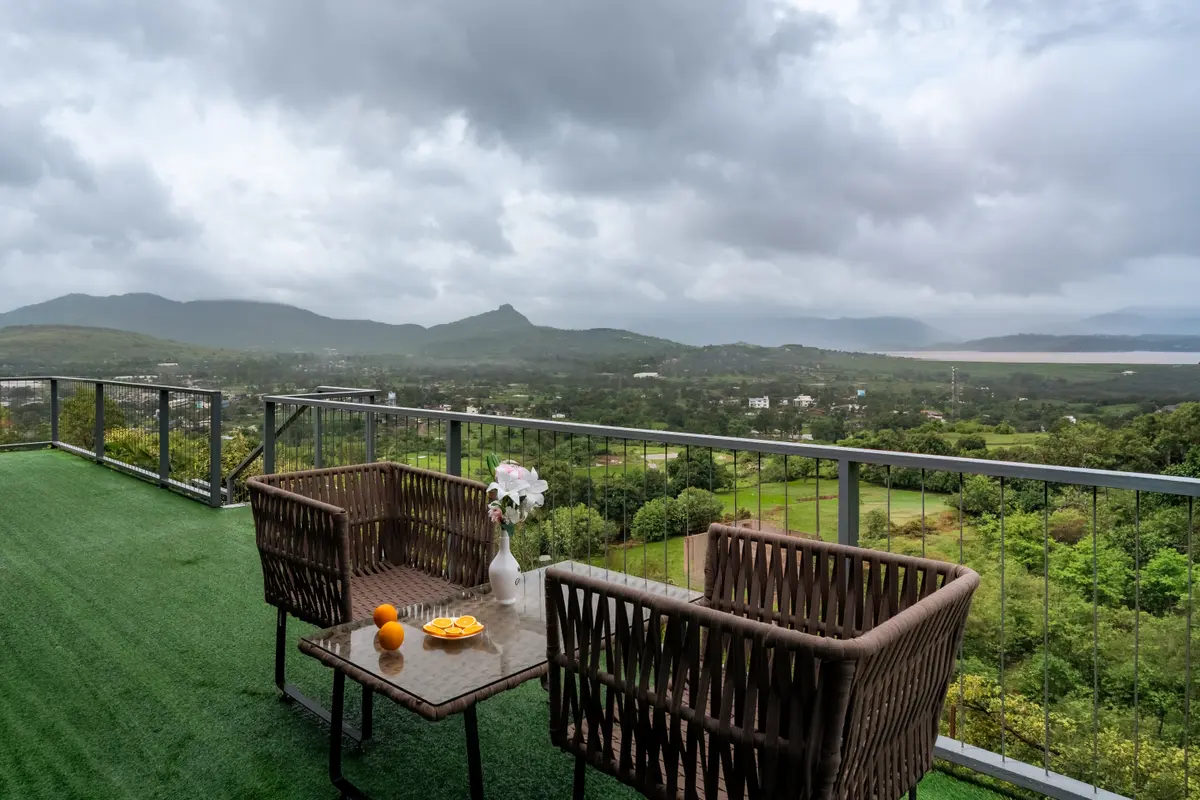 Your private deck above the Sahyadri landscape.