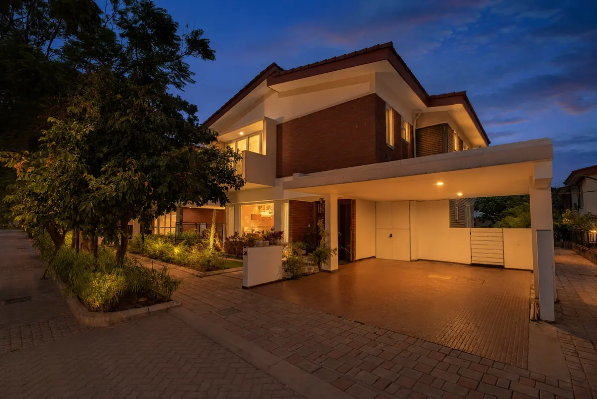 A contemporary villa set amidst lush greenery in a peaceful neighbourhood.