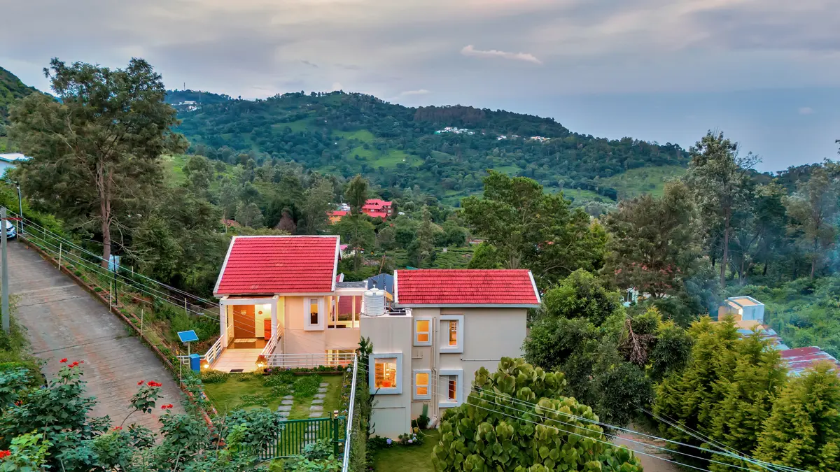 A charming hillside retreat tucked amidst the greenery.