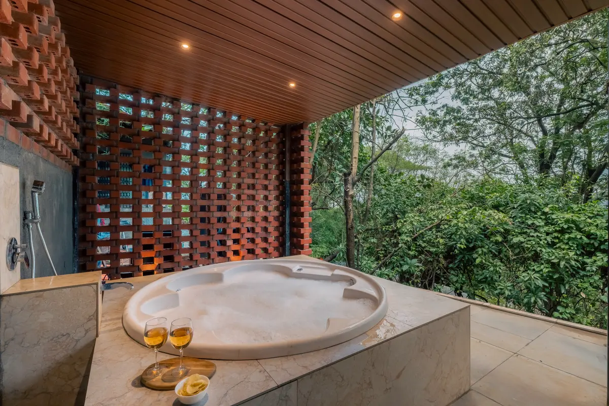 Sink into the private Jacuzzi for a long, relaxing soak.