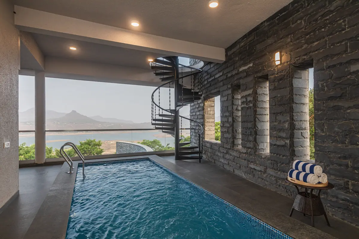 Large indoor pool that offers gorgeous views of Pawna Lake