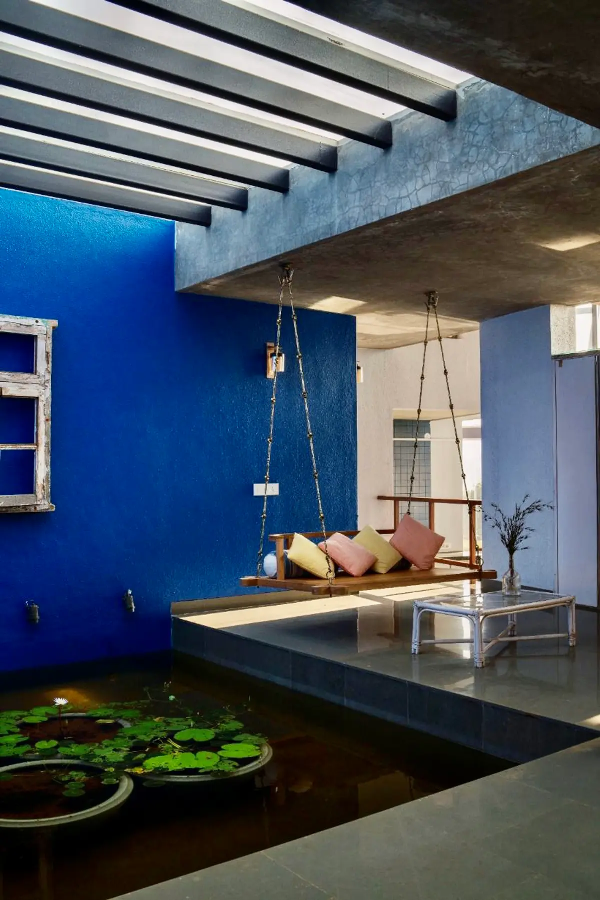 Relax by the pond and enjoy a peaceful moment on the swing.