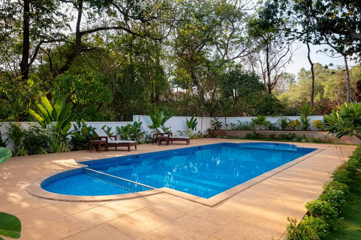 Sit back and lounge by the azure swimming pool and soak in the Goan breeze. 