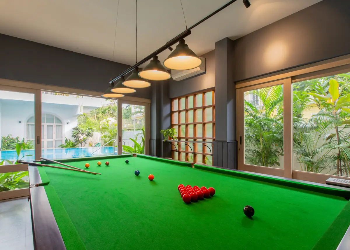 This home has a snooker lounge and provision for a card night (poker chips + mat) along with several board games - shall we extend your stay already?